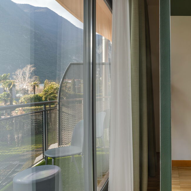 Superior with balcony and park view: Interior and exterior blend together in the name of nature
